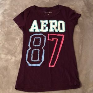 Maroon Aeropostale graphic tee.